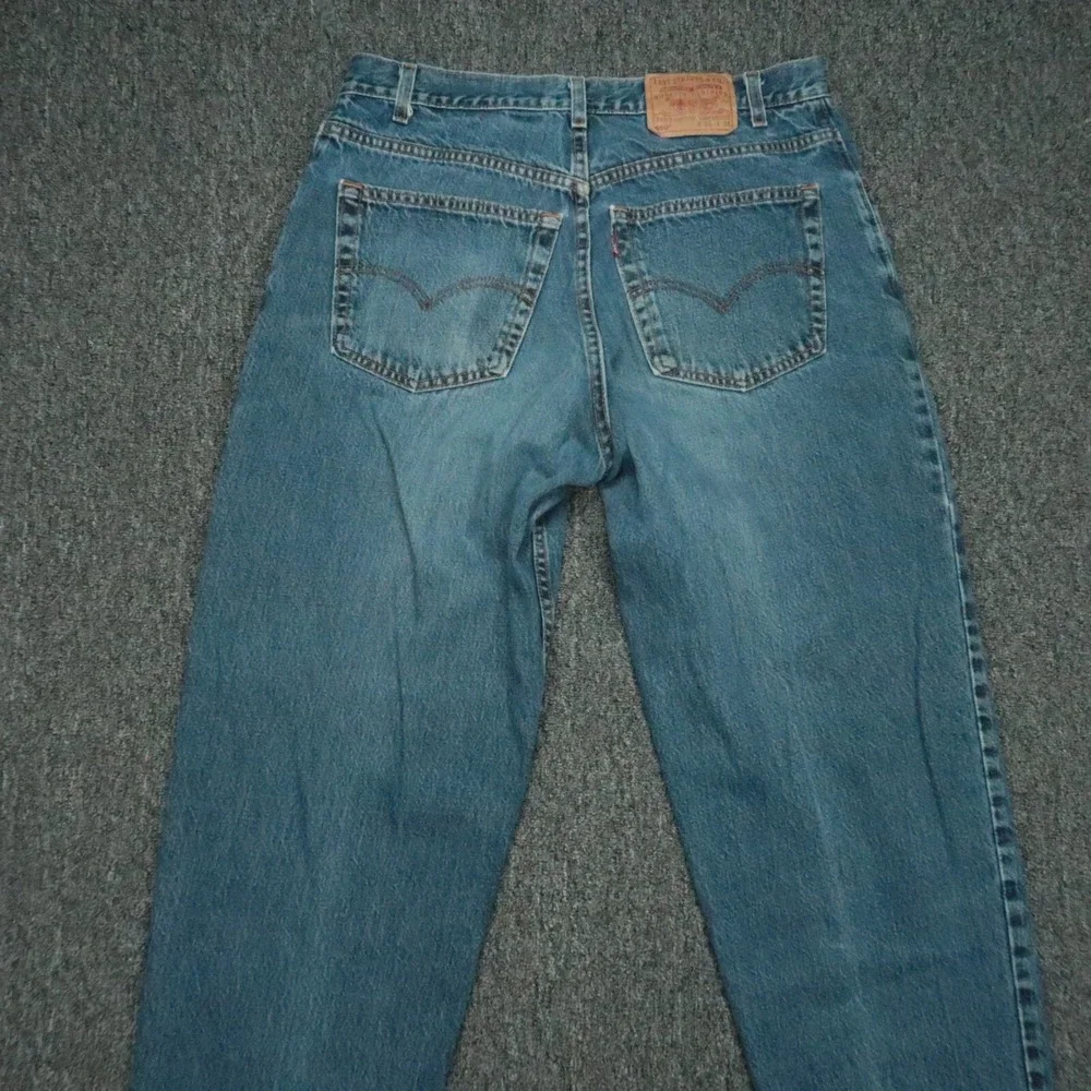 VINTAGE Levis Jeans Mens 34x34 Blue 560 Loose Fit Tapered Leg USA Y2K